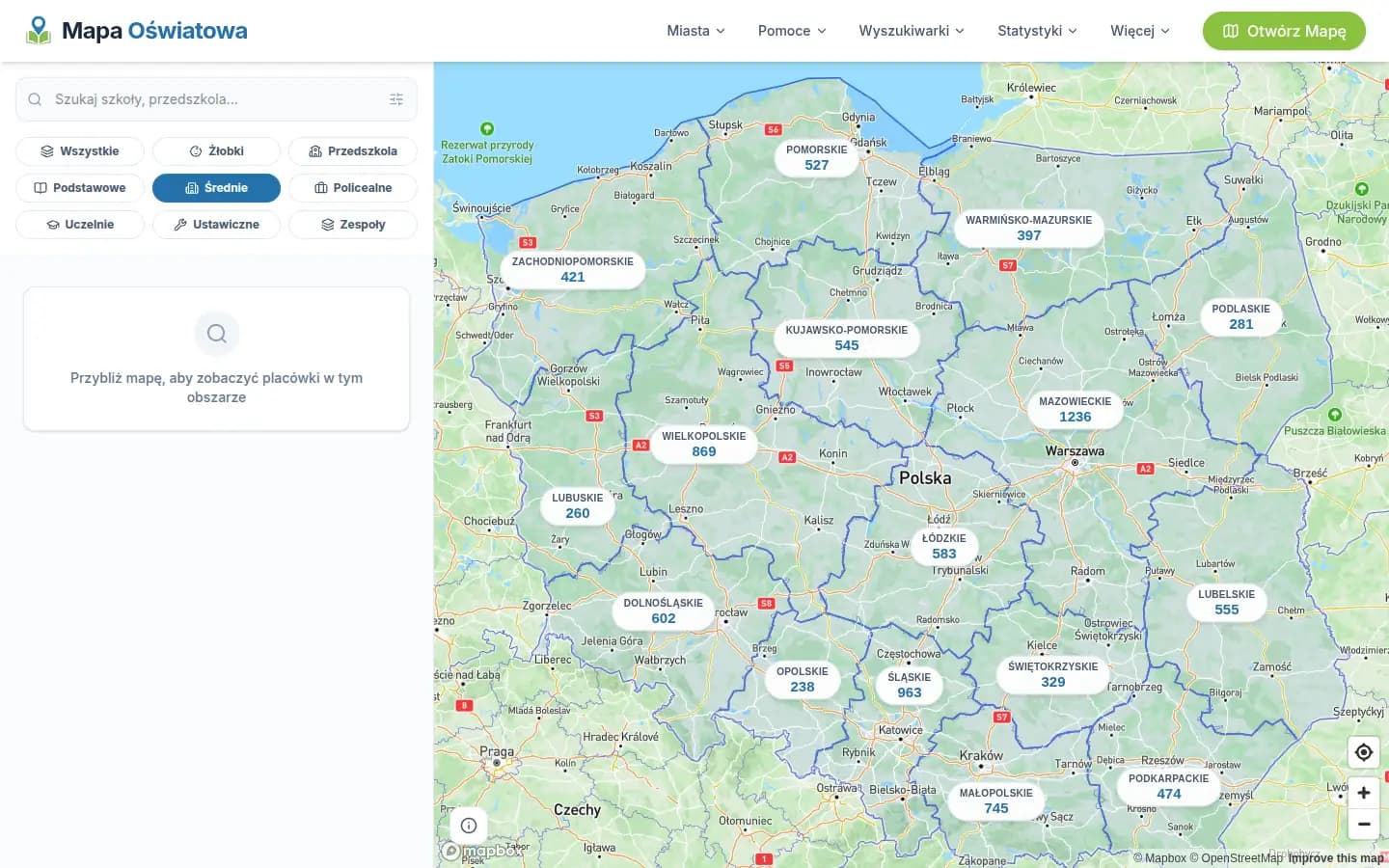 The interactive map zoomed out to the whole of Poland, with secondary schools counted per voivodeship in clustered markers
